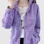 Purple hooded zip-up jacket with allover leaf print, elastic cuffs, side pockets