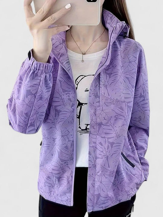 Purple hooded zip-up jacket with allover leaf print, elastic cuffs, side pockets