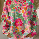 Soft knit pullover with multicolor floral print, long sleeves, button placket