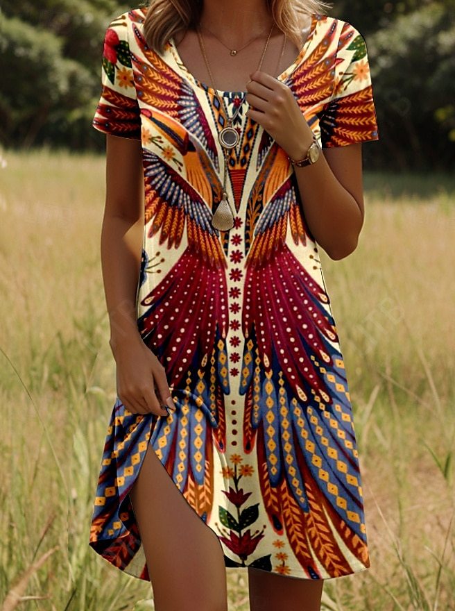 Bohemian print dress with short sleeves, orange and navy swirl pattern with white accents
