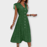 Elegantes Midi-Kleid mit Punkten