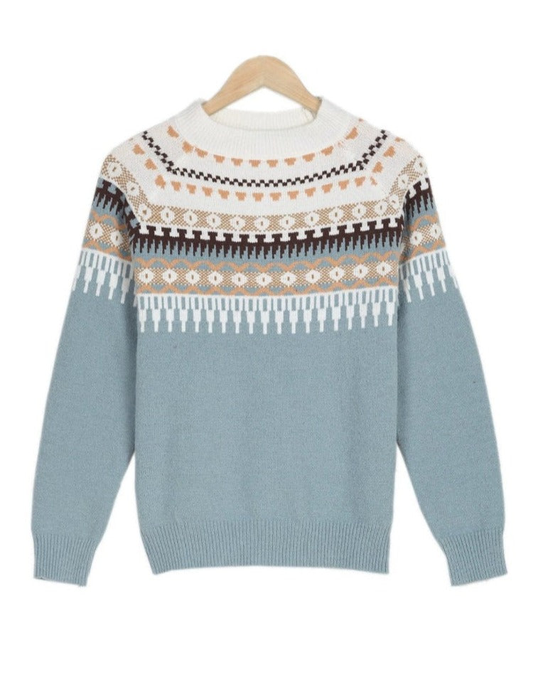 Light blue fair isle knit pullover with crew neck and long sleeves, hanging