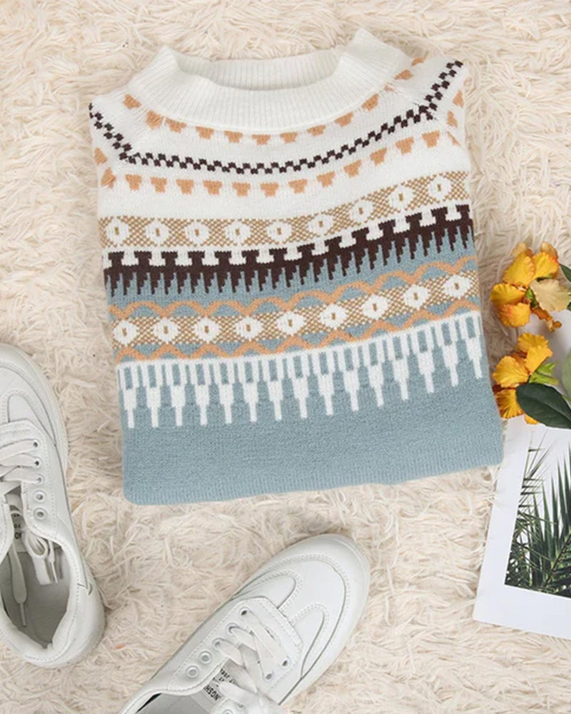 Light blue fair isle knit pullover with crew neck and patterned yoke