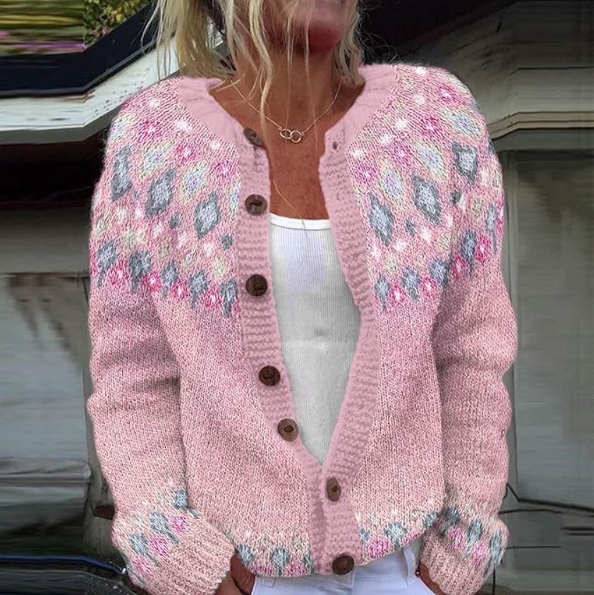 Pink knit cardigan with multicolor diamond pattern, button placket and V-neck