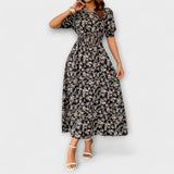 Amelia - Kleid mit Rundhalsausschnitt und floralem Muster