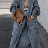 Women's maxi knit cardigan with long sleeves and front pockets, blue textured knit