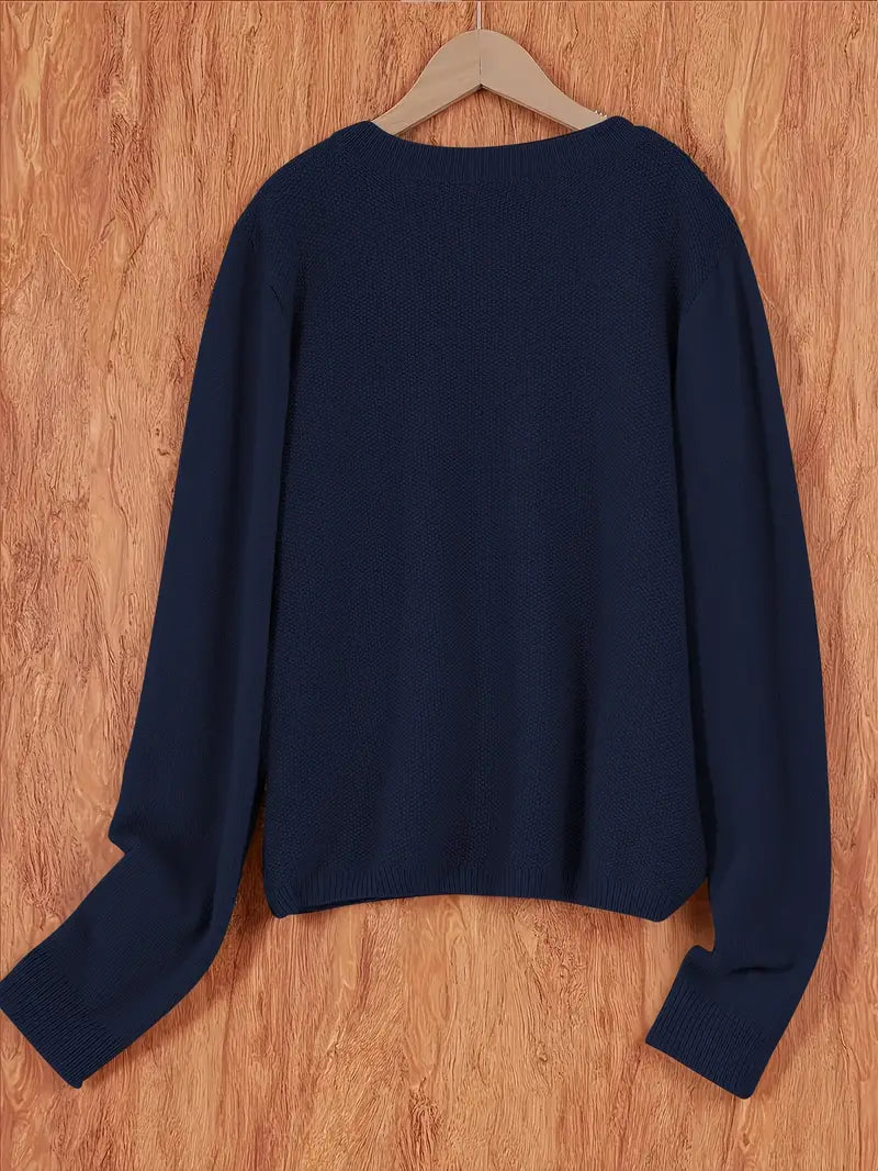 Women’s round-neck cardigan with long sleeves, dark blue knit texture, cropped back view