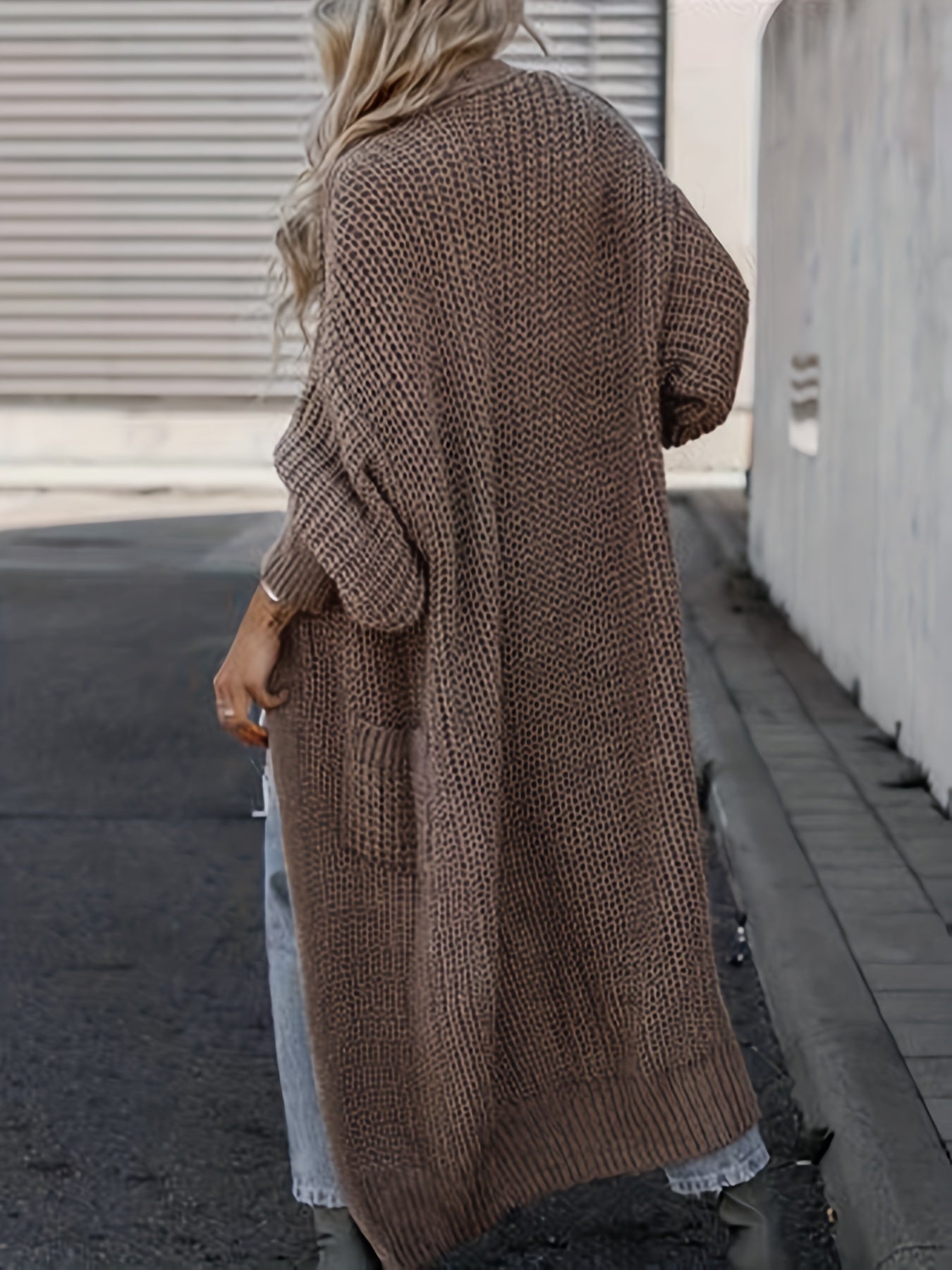 Dark brown long knit cardigan with open front, long sleeves, and side pockets