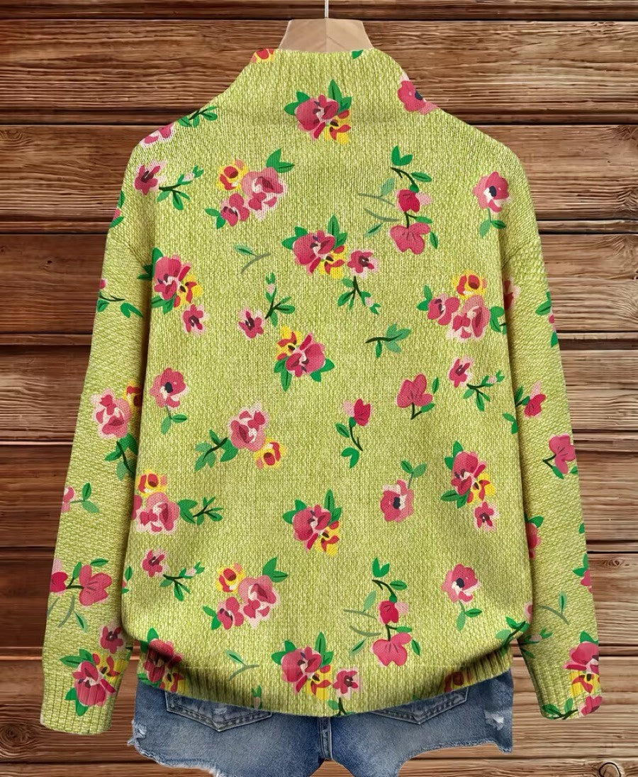 Back of floral knit cardigan in lime green with pink flower pattern