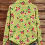 Back of floral knit cardigan in lime green with pink flower pattern
