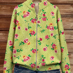 Lime green floral knit cardigan with full front zipper and stand collar