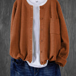Rust brown round-neck cardigan with button front and side pocket