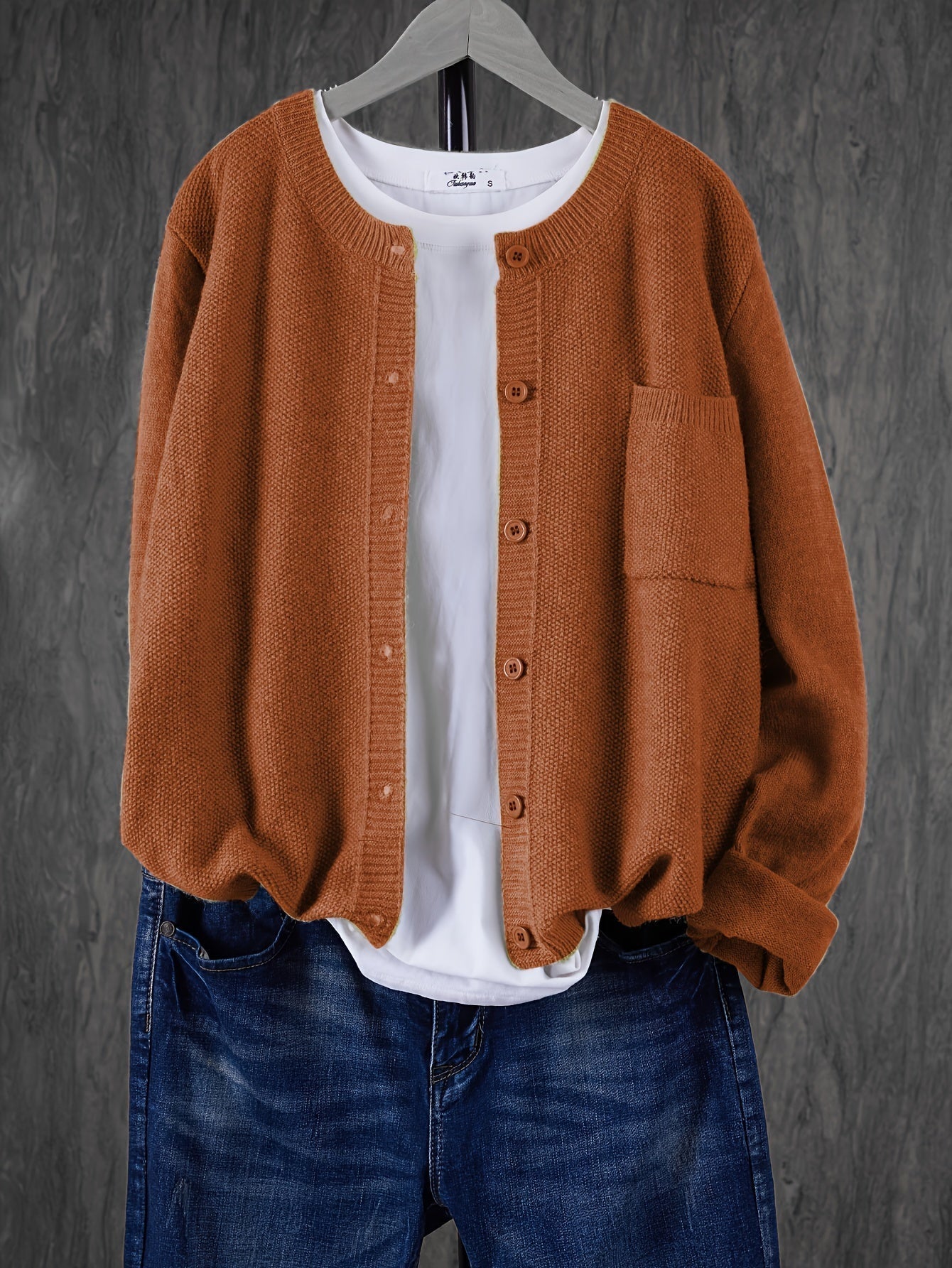 Rust brown round-neck cardigan with button front and side pocket