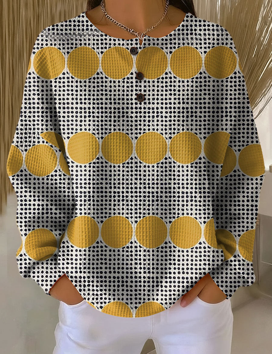 Vintage pullover sweater, white knit with black dots and yellow circle pattern.