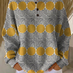 Vintage pullover sweater, white knit with black dots and yellow circle pattern.