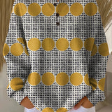 Vintage pullover sweater, white knit with black dots and yellow circle pattern.
