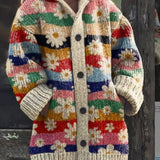 Knitted cat cardigan in cream with colorful striped patchwork blocks and button-front.