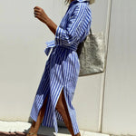 Blue and white striped shirt dress with long sleeves, waist tie, side slit midi length
