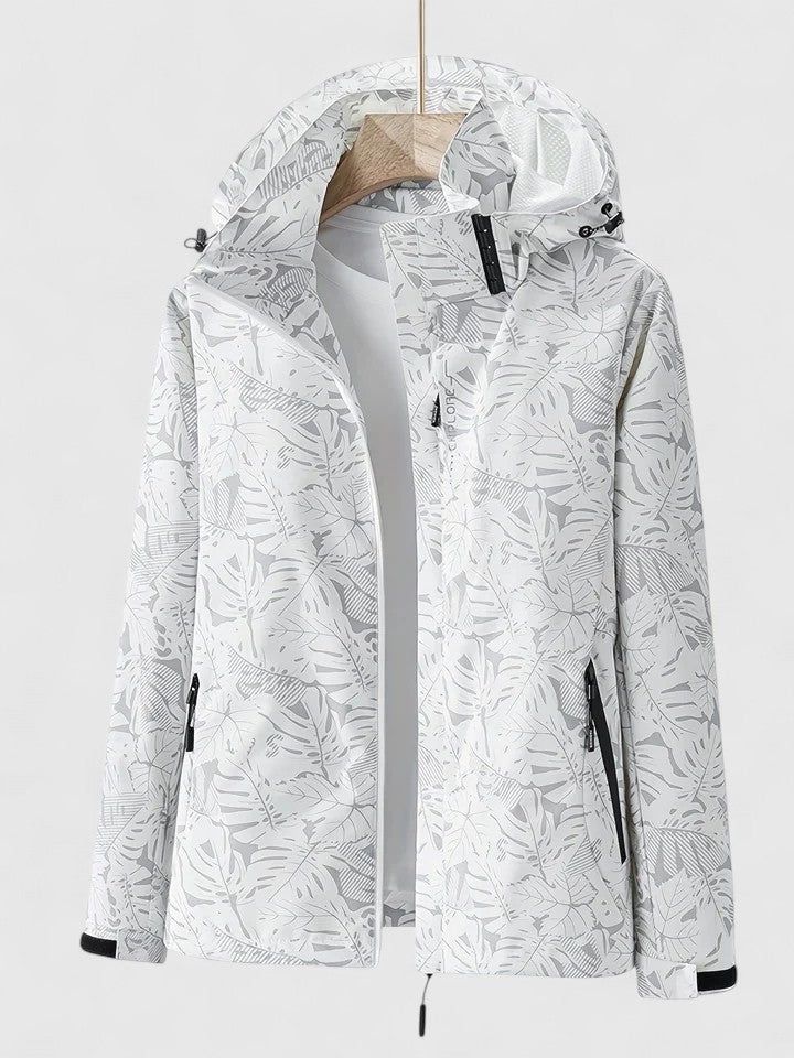 White hooded jacket with front zipper and stand collar, allover leaf pattern