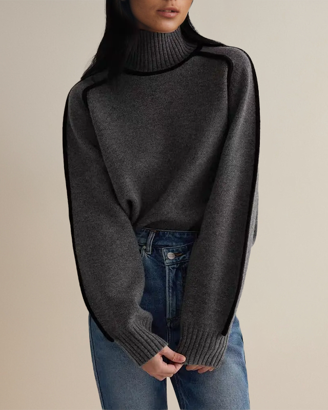 Dark gray turtleneck sweater with ribbed neckline and sleeve cuffs