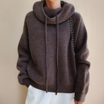 Brown knit rollneck pullover with drawstring cowl neck and ribbed hem