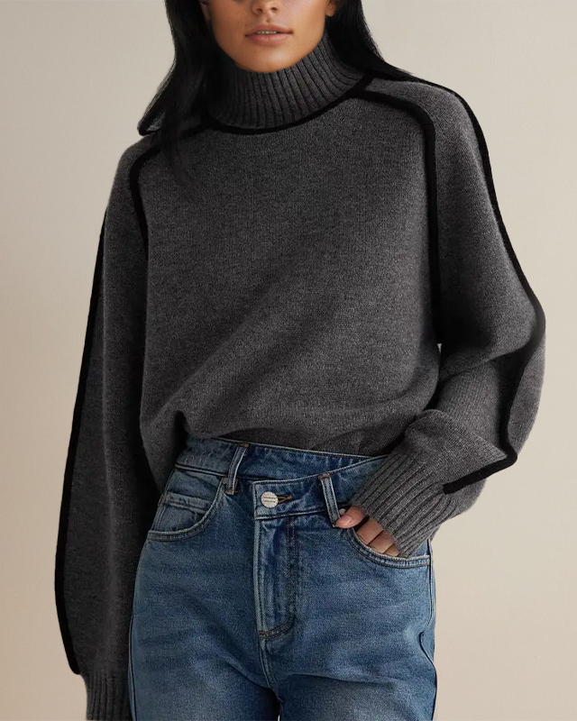 Dark gray turtleneck sweater with ribbed collar and cuffs, relaxed knit