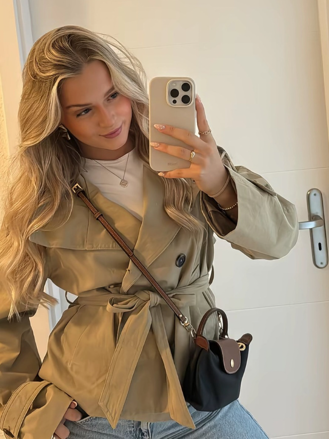 Women's khaki stand-collar jacket with double-breasted buttons and tied belt at waist