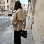 Women's khaki stand-collar long-sleeve jacket with belt tie; back view