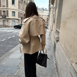 Women's khaki stand-collar long-sleeve jacket with belt tie; back view