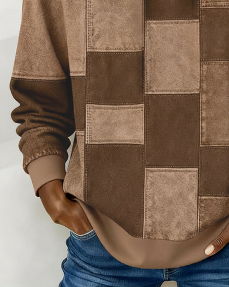 Brown patchwork hoodie front detail with hood, square panels and long sleeves