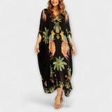 Linda - Eindrucksvolles Kleid mit asymmetrischen Trägern und Palmendruck