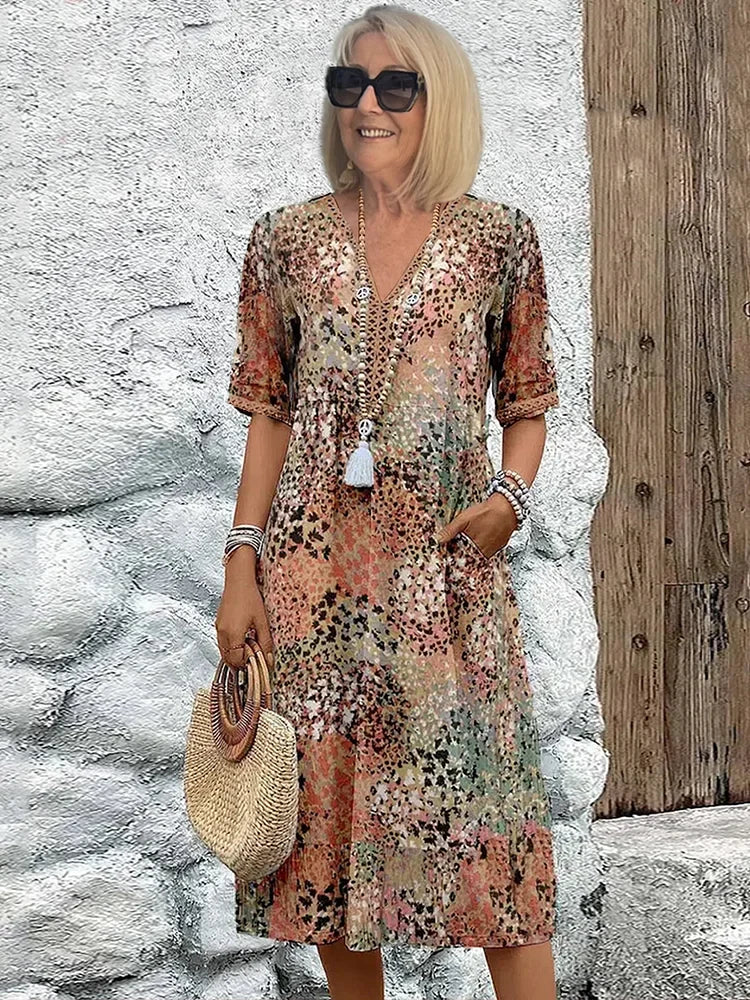 Monica elegant floral dress in beige, V-neck button front with tassel, short sleeves