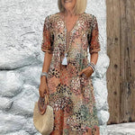Monica elegant floral dress in beige, V-neck button front with tassel, short sleeves