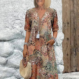 Monica elegant floral dress in beige, V-neck button front with tassel, short sleeves