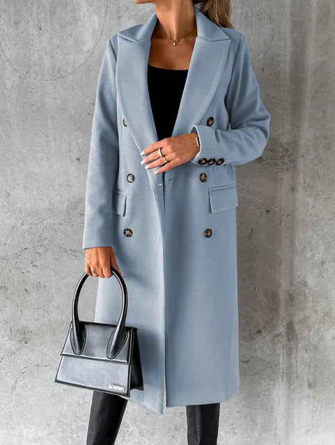 Light blue double-breasted overcoat with notch lapels, long sleeves, and decorative buttons