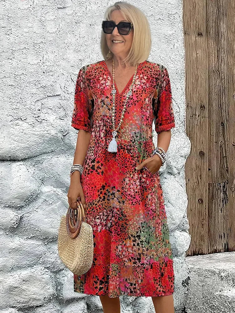 Monica elegant floral dress in red, V-neck button front with tassel, short sleeves