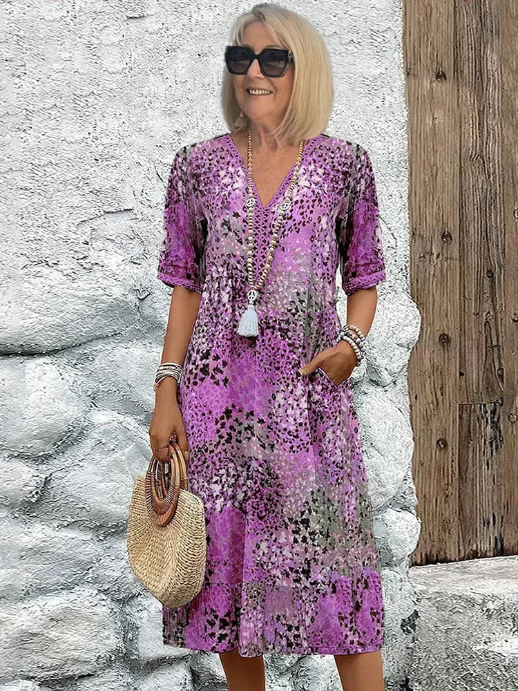 Monica elegant floral dress in purple, V-neck button front with tassel, short sleeves