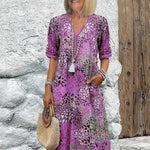 Monica elegant floral dress in purple, V-neck button front with tassel, short sleeves