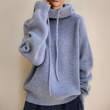 Light blue knit rollneck pullover with drawstring cowl neck and ribbed cuffs