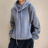 Light blue knit rollneck pullover with drawstring cowl and ribbed hem