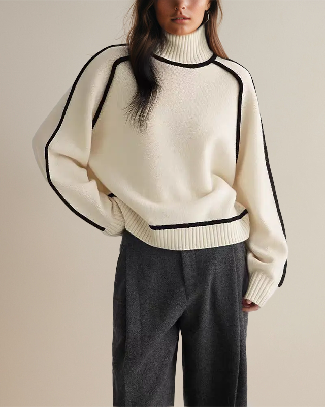 Off-white turtleneck sweater with black trim, ribbed hem and cuffs