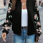 Black zip-up jacket with floral print sleeves, ribbed hem and cuffs