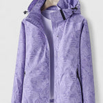 Purple hooded jacket with front zipper and stand collar, leaf-patterned fabric