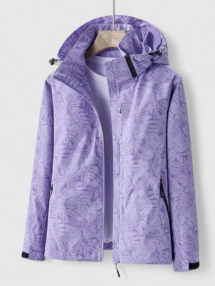 Purple hooded jacket with front zipper and stand collar, leaf-patterned fabric