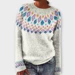 Classic retro knit pullover with crew neck, light base and multicolor dotted pattern