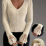 Cream ribbed V-neck button top with lace-trim cuffs
