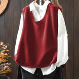 Red sleeveless knit Grace cardigan with ribbed cowl neck and long button row