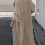 Beige long knit cardigan with open front, long sleeves, and side pockets