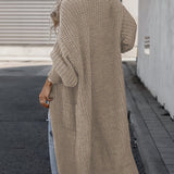 Beige long knit cardigan with open front, long sleeves, and side pockets