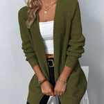 Women's long knit cardigan in green, open front with patch pockets and ribbed cuffs